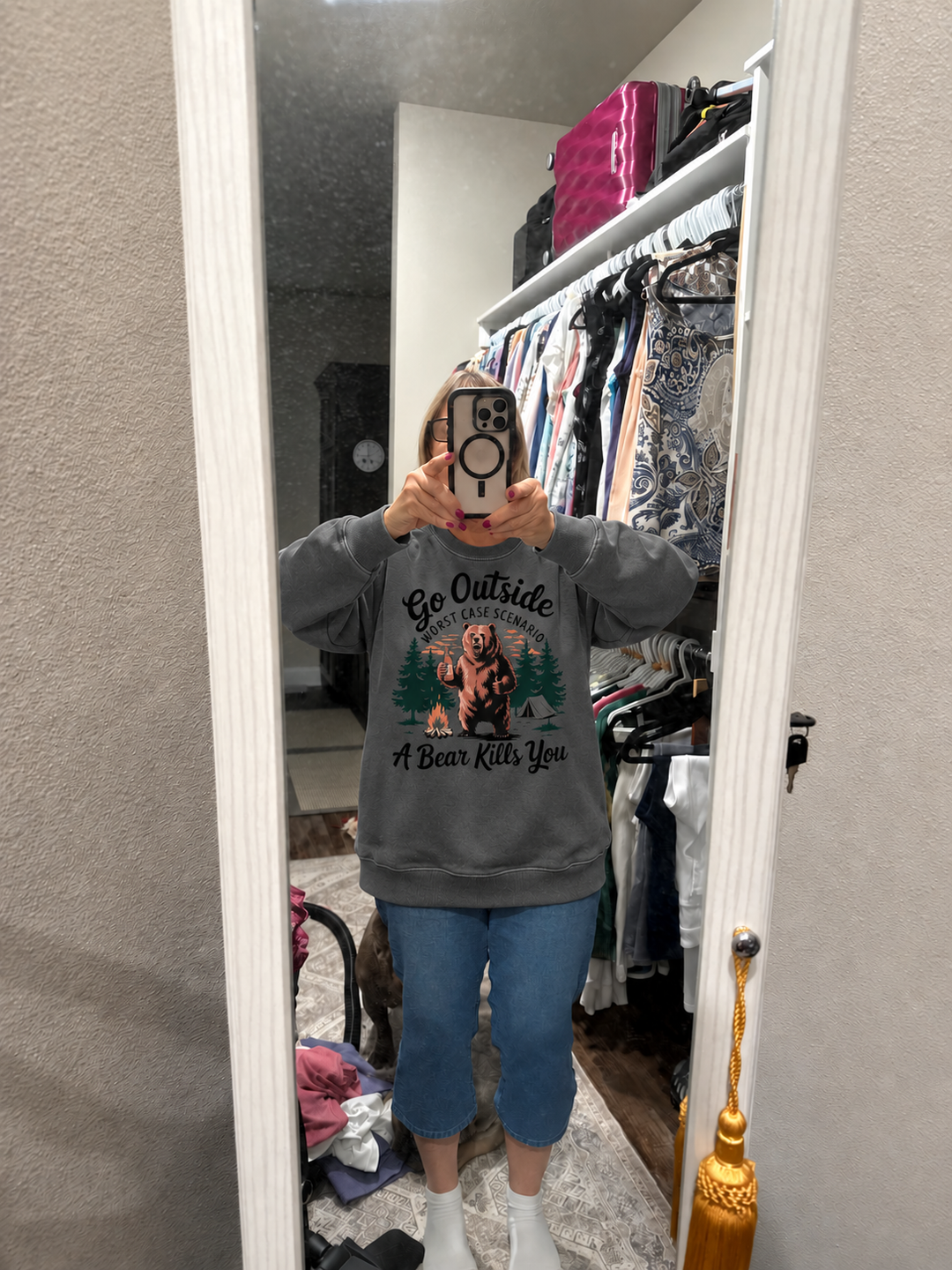 Edited customer photo showing the Go Outside Sweatshirt in Pepper