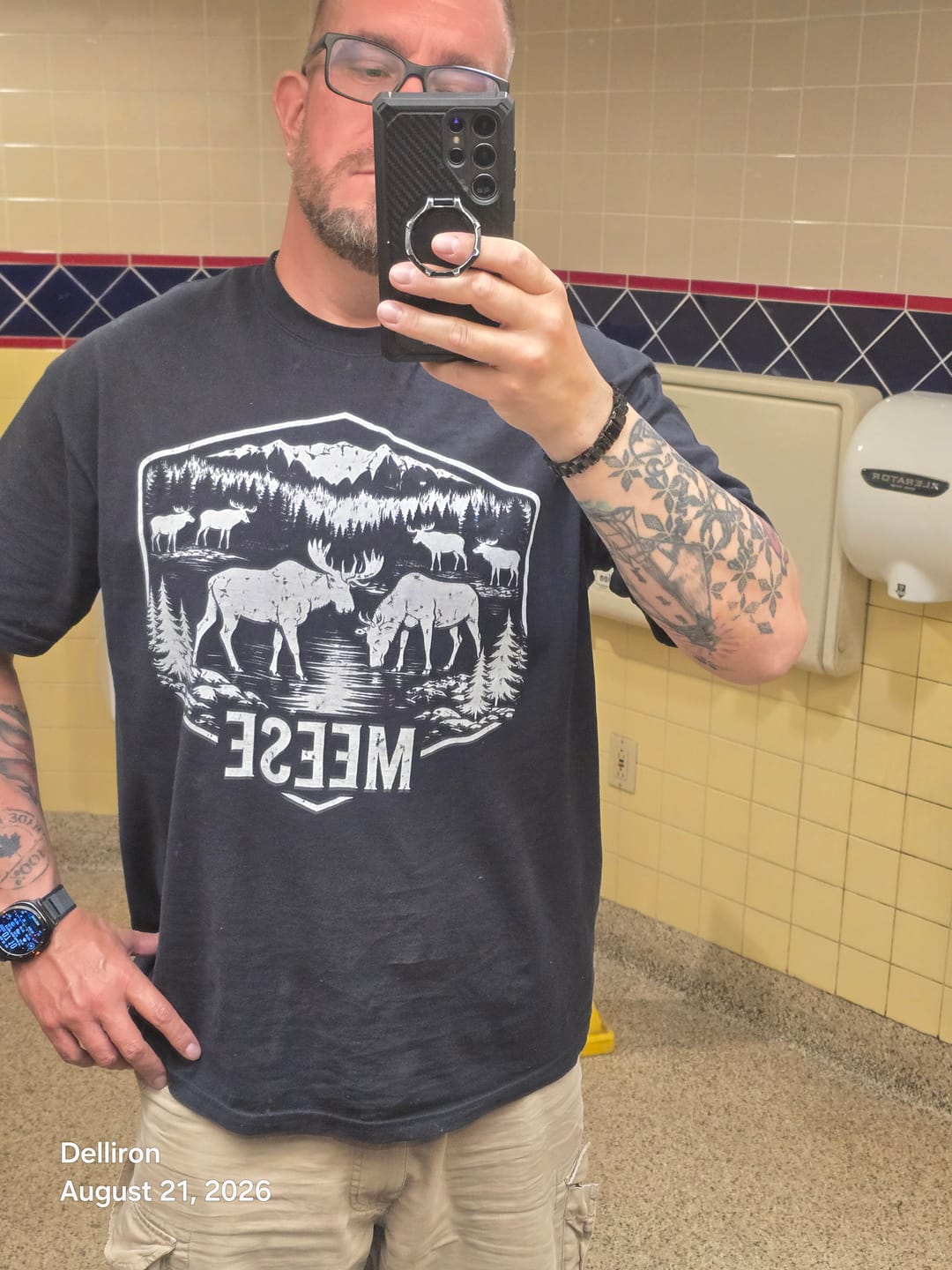 Brady wearing his black Meese Comfort Colors tee in size XL